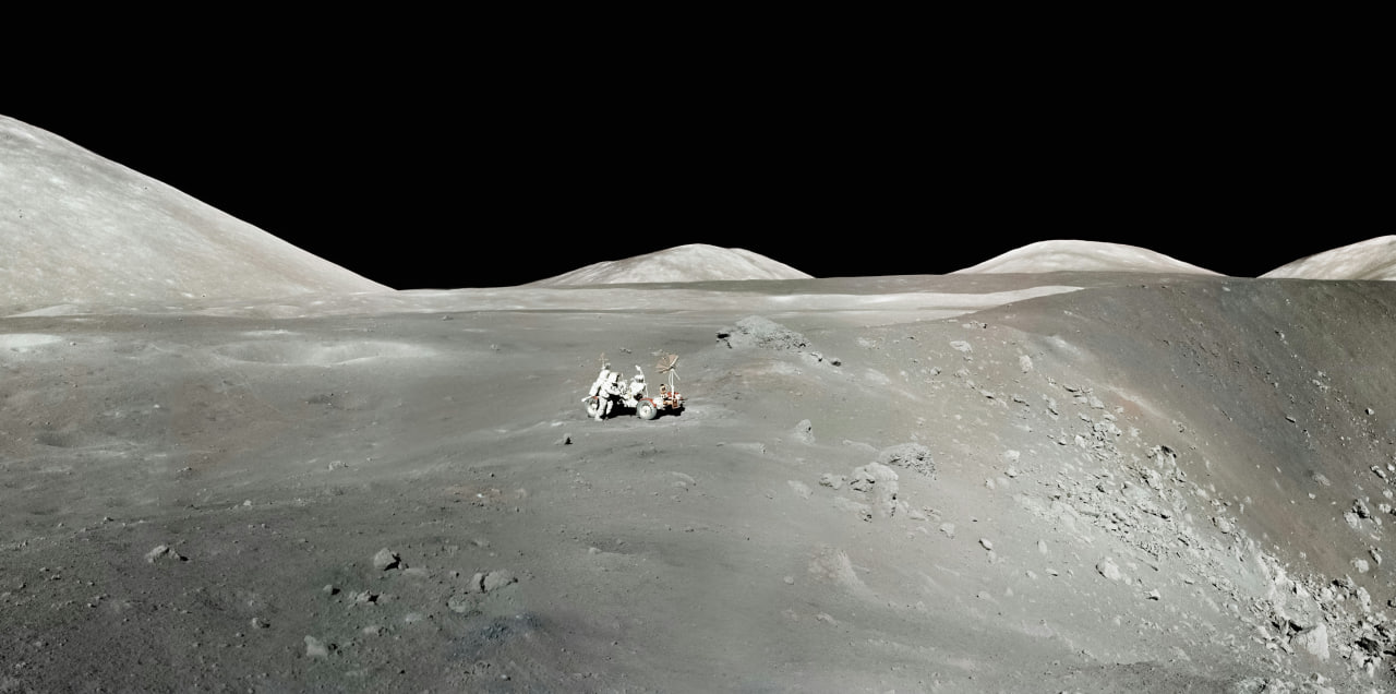 Astronaut and lunar rover on the surface of the Moon